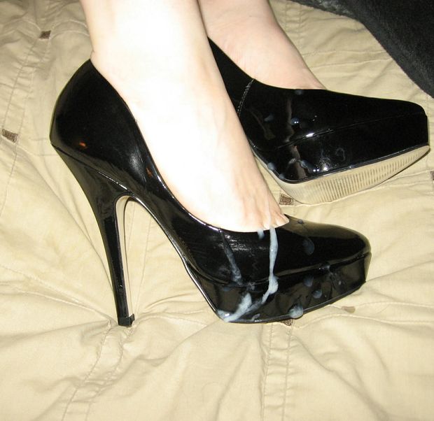 Cumshot on black high heels