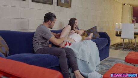 Exhibitionist couple share a cute roomie in the living room