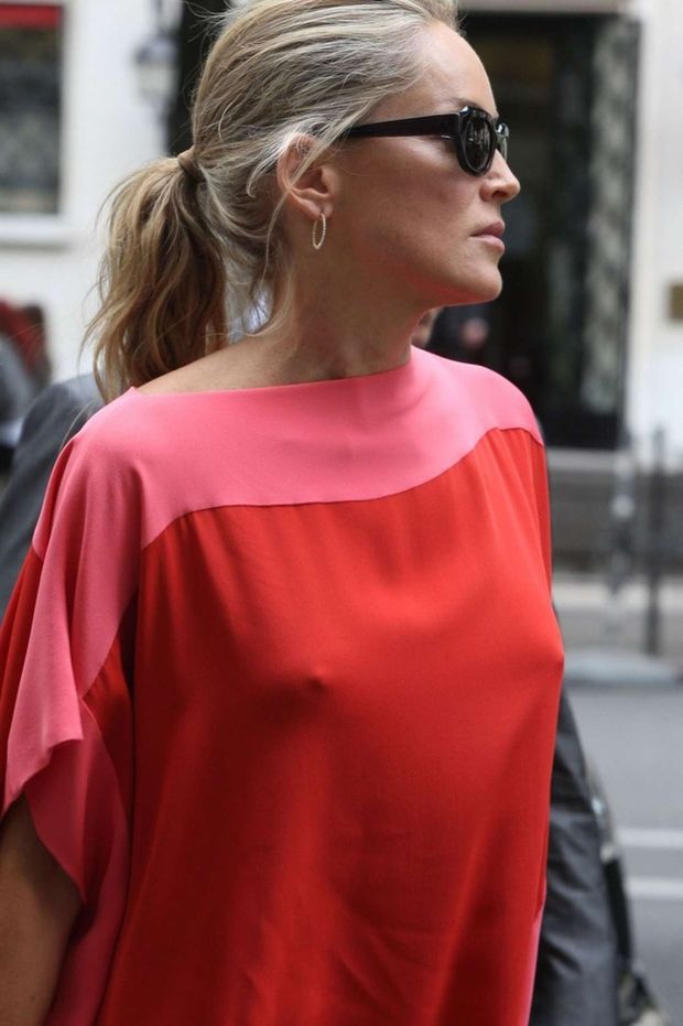 Sharon Stone braless pokies on the street
