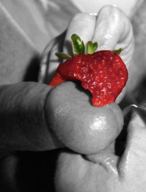 eating strawberry off cock