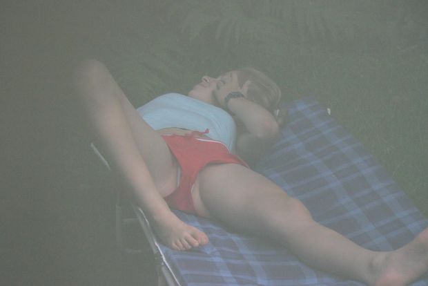 Teen in red shorts
