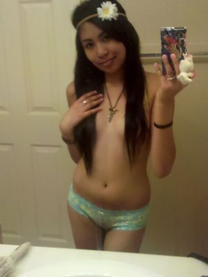 Sexy long hair asian teen nude boobless selfie