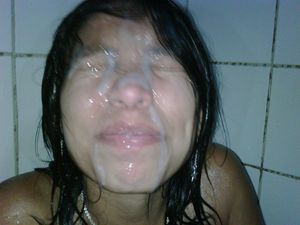 Amateur Asian has her face completely covered with cum, she can't open her eyes