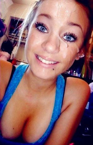 Smiling with a face full of cum