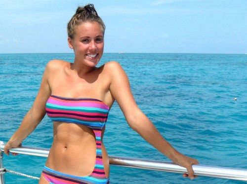 Hot blonde shows her fit body and cute smile