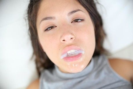 Mouth filled with cum