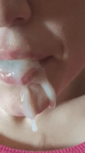 Mouth full of cum