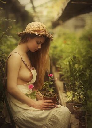 Cute braless teen in garden