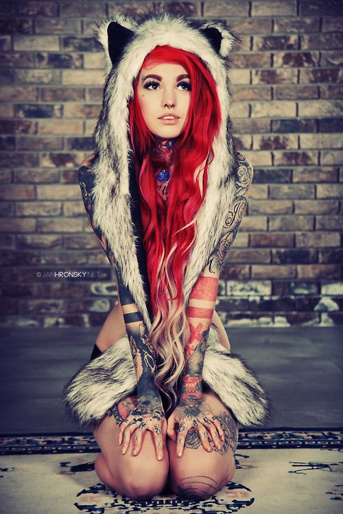 Pretty redhead teen with tattoos