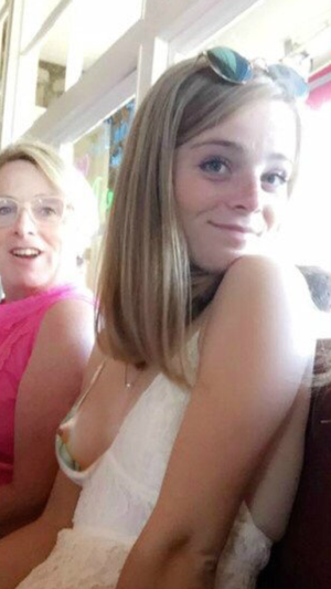 Nipple slip and a cute grin