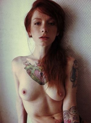 Tattooed Redhead chick