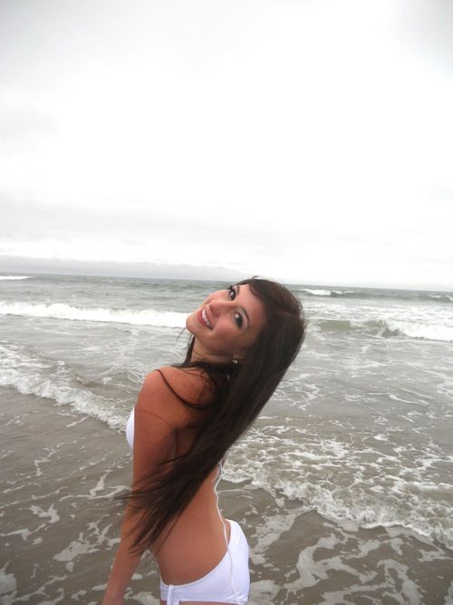 Smiling cutie in white bikini