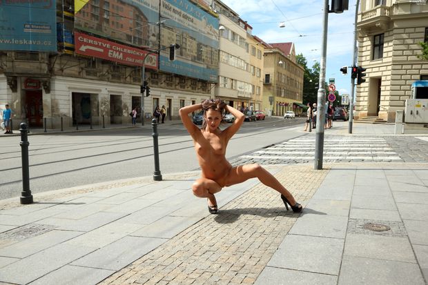 Sexy brunette naked in public street in Prague