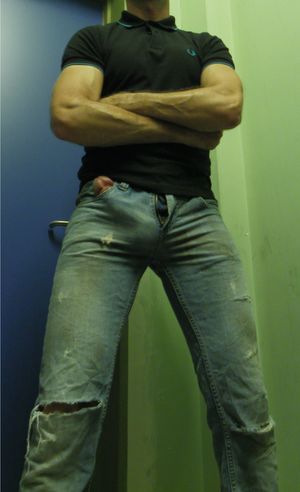 cock head out of jeans pocket