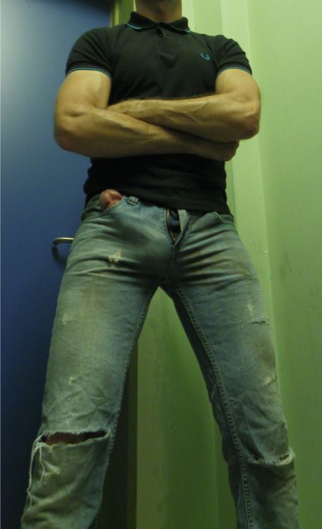cock head out of jeans pocket