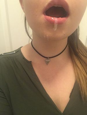 Dripping out of her mouth