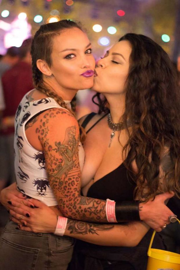 Pretty lesbo with big tits kissing her girlfriend
