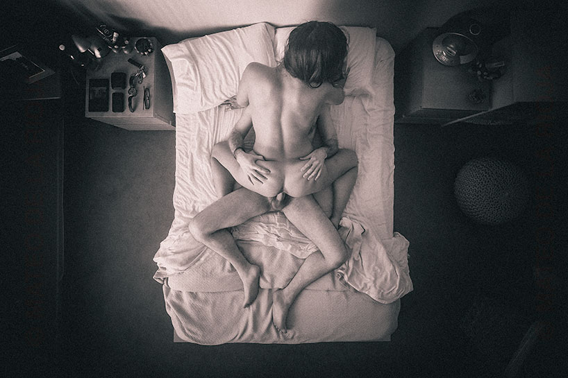 View from above of couple having sex in cowgirl position