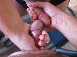 Me and friend holding each other's cocks