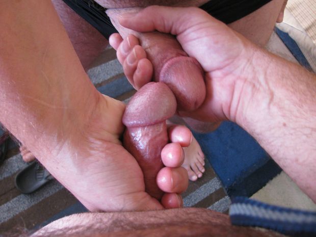 Me and friend holding each other's cocks