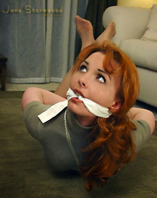 Beautiful bound redhead