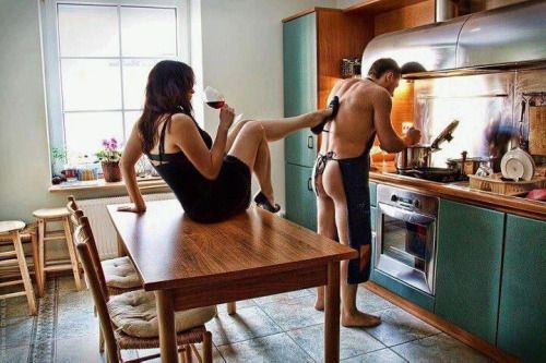 Serving Her Mistress in the kitchen