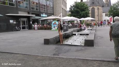 Sexy babe Kira naked on public streets