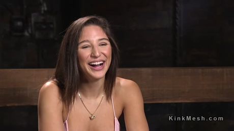 Brunette in extreme bondage toyed