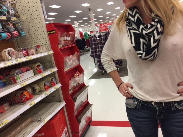 Blonde wife without bra in public