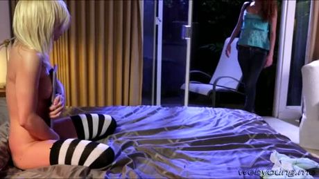 Tara is watching a porn film and Rebel asks permission to watch the seductive film to. Soon they goes pussy licking and tribbing.