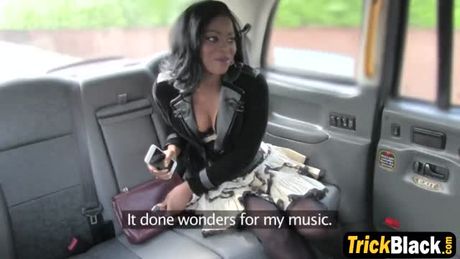 Lovely British ebony model fucked in taxi. White cock drilled her mouth and black pussy