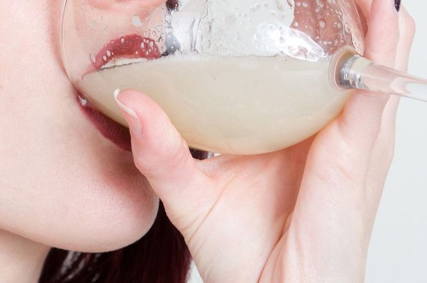 slut drinking wineglass of cum