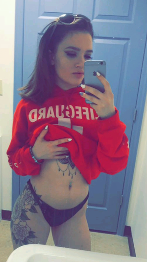 Suductive tattoo showing