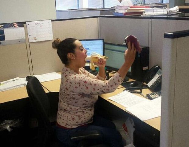 Taking a selfie of going down on a banana at work