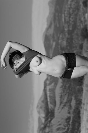 Naked in a field of wild horses.