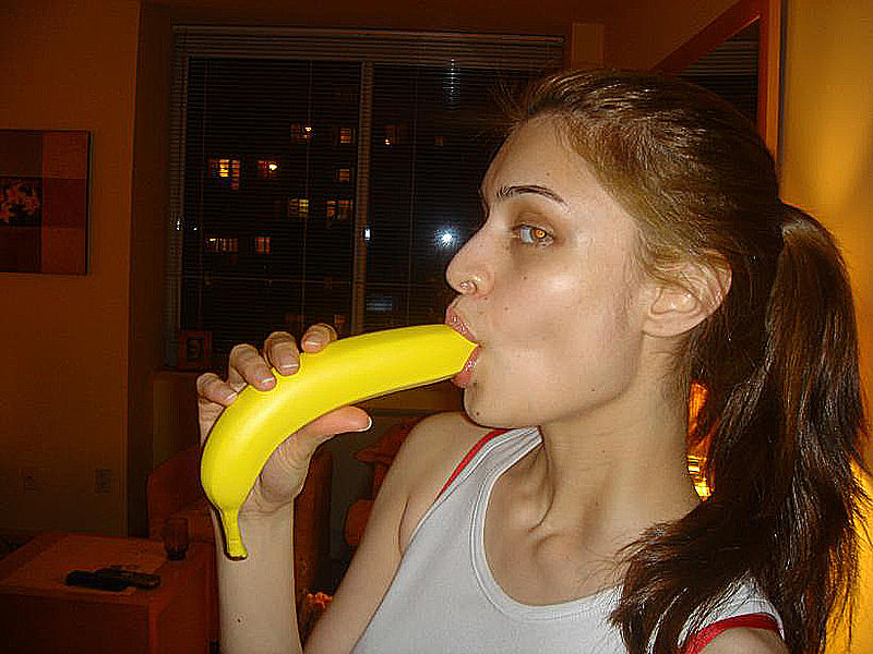 sucking a banana