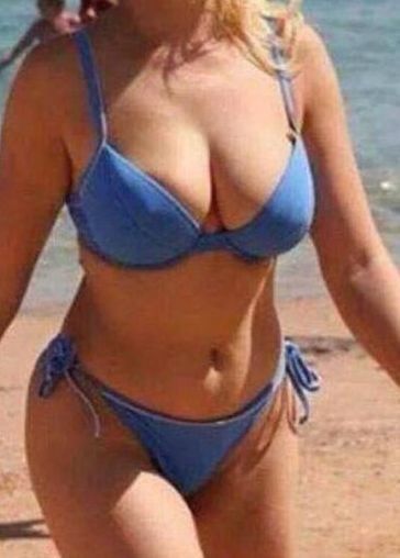 blonde milf in blue bikini at the beach