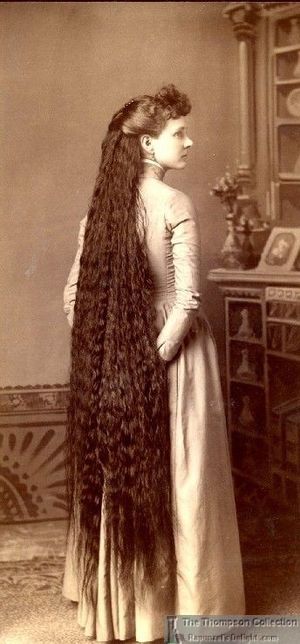 Esmeralda wore her hair down at home for her husband to enjoy.