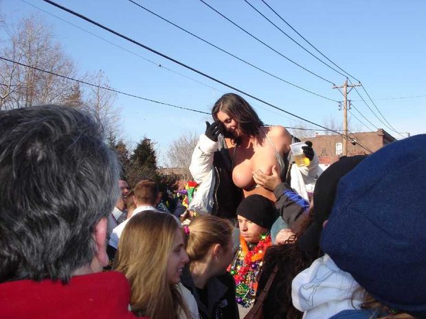 Flashing her boobs in public and being groped in the process.