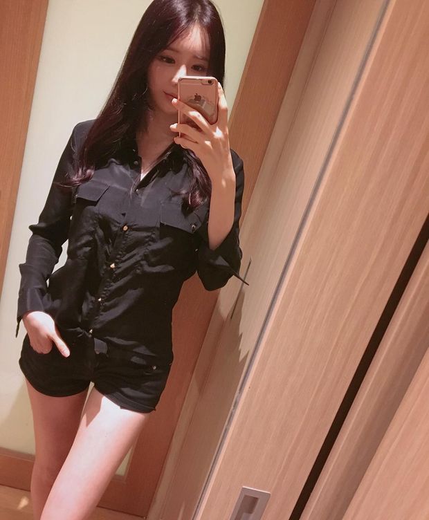 boraoju in black blouse and shorts
