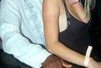 blonde hotwife flirting at cuckolding club
