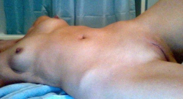 Nude full body- the important bits anyway- enticing Sir to come over and lick me