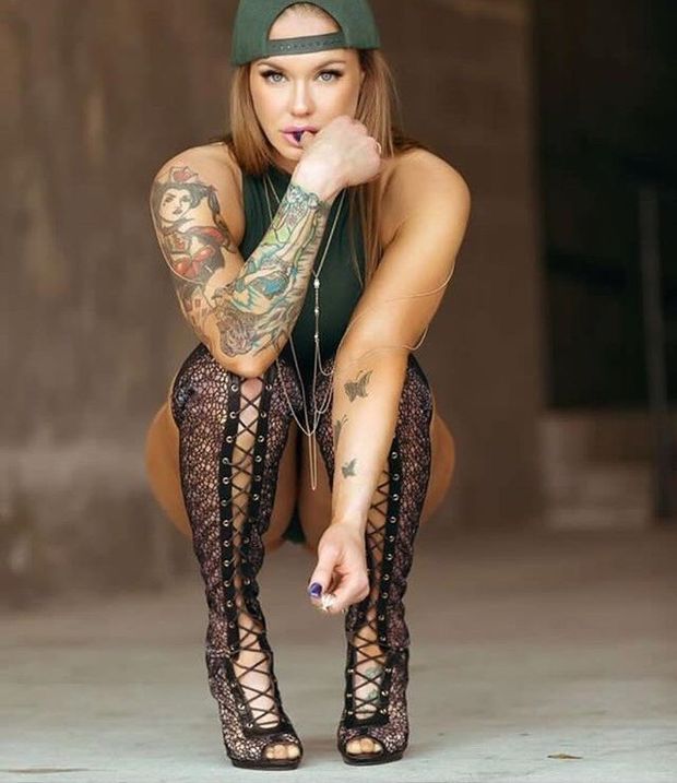 Sexy tattoo babe in heels