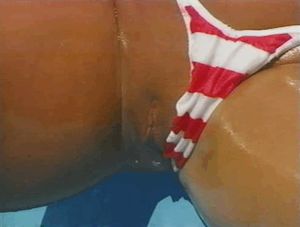 Bronzed Babe is Oiled and Horny