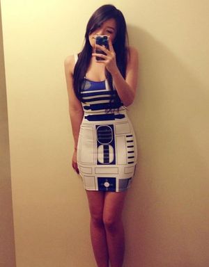 Figure hugging dress.