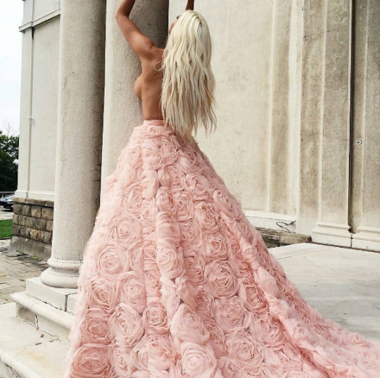 I was admiring the intricate flowing gown so much it took me a bit to realize she was topless.