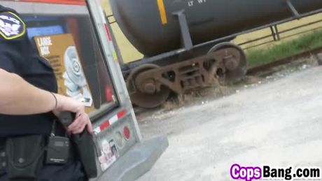 Cock loving female busy police officers caught in a hardcore interracial threesome!