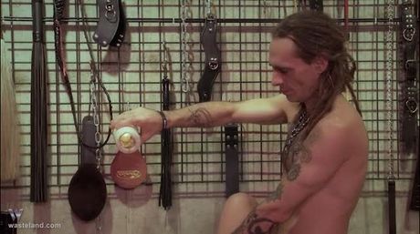 BDSM Film – Psychedelic Bondage. BDSM Master Shadrack feels creative today as he binds his lovely submissive in brightly colored ropes.