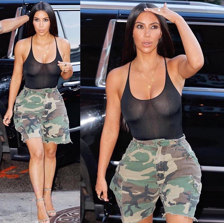 Kim K flaunts her awesome nips in a see through top