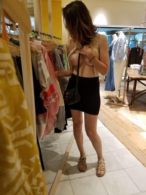 Sexy teen showing her boobs